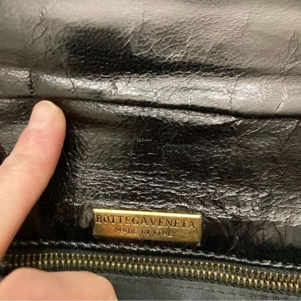 Bottega Veneta black Italian leather clutch bag